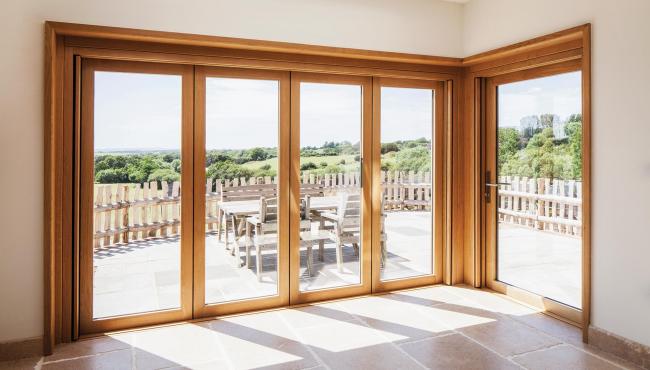 205 Integrated Folding Door transforming a country style living space