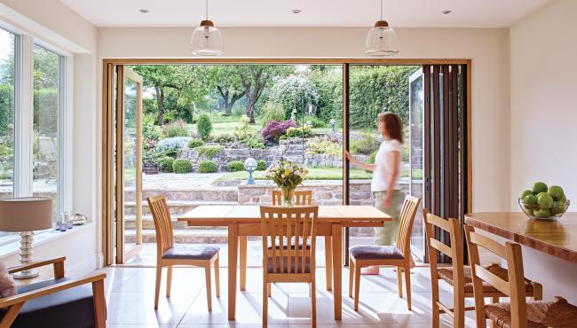 Centor folding patio doors with retractable fly screen to keep insects out