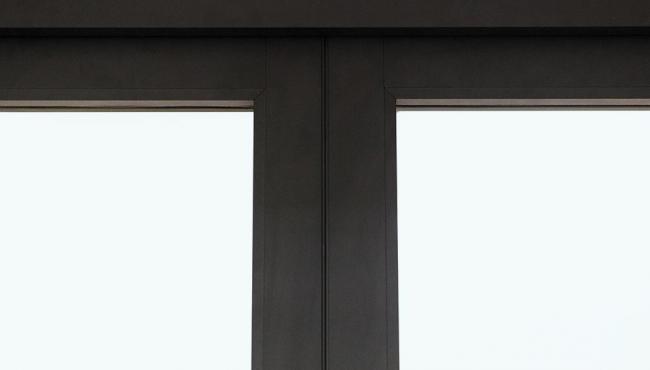 The concealed hinge on folding doors is hidden from sight within the edge of the door