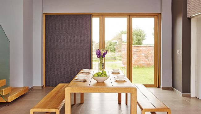 Centor 205 Integrated Folding Door with built-in shade for a barn conversion