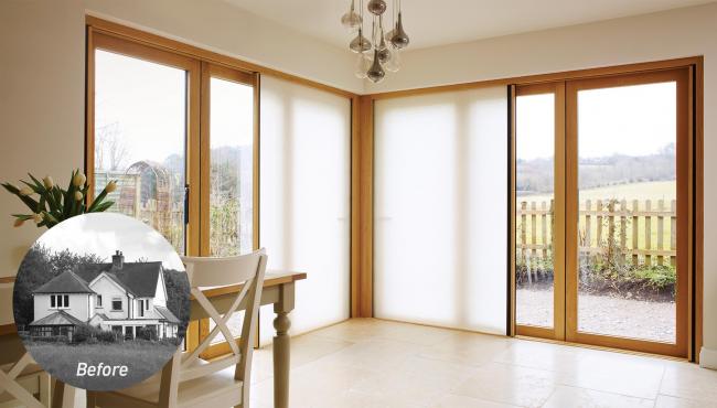 Two joining 205 Integrated Folding Doors with built-in light-filtering shade