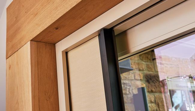Centor blinds for bifolds are built into the door frame to help save space