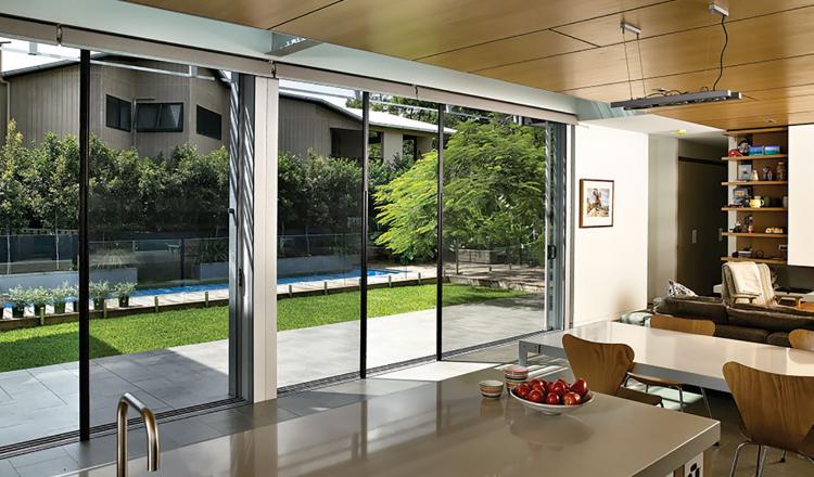Centor S2 double retractable screen complements large openings including folding, sliding and double-swing doors.