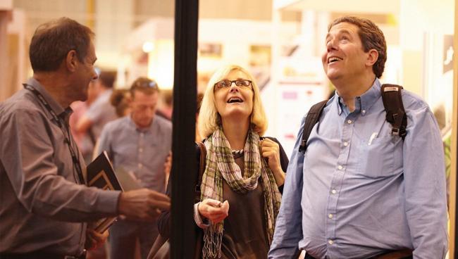 Homeowners amazed with Integrated Doors with integral fly screen at Grand Designs Live